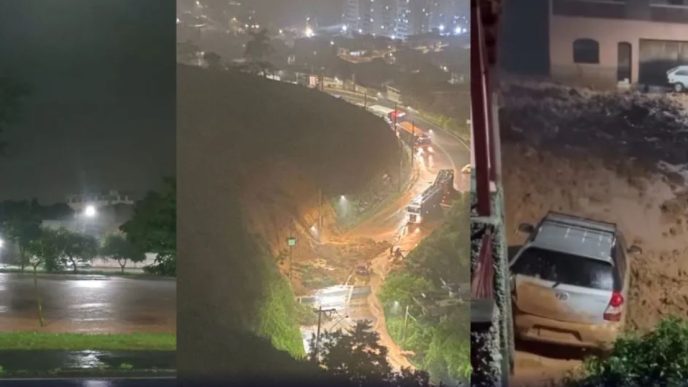 Imagem noturna mostra ruas alagadas e deslizamento de terra em Juiz de Fora (MG), com lama cobrindo via e veículo atingido após forte temporal.