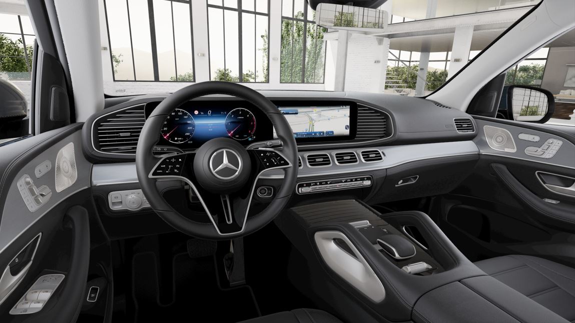 Interior do Mercedes-Benz GLE 450 d AMG Line com painel digital widescreen, volante multifuncional, acabamento premium e sistema MBUX